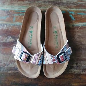 Riposella natural slide on sandals